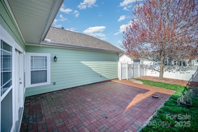 view of patio / terrace featuring fence