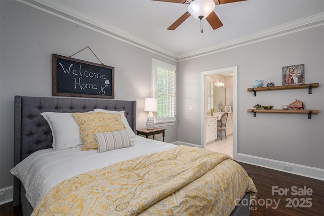 bedroom featuring wood finished floors, connected bathroom, crown molding, baseboards, and ceiling fan