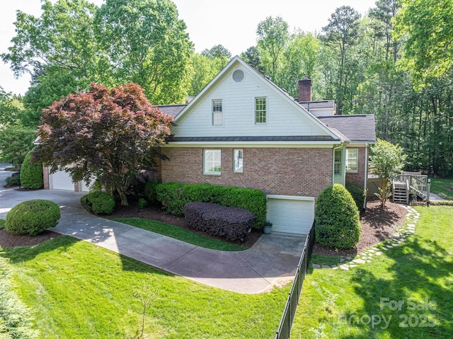view of property exterior featuring brick siding, driveway, and a chimney