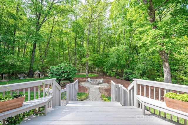 deck featuring an outdoor fire pit