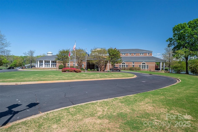 exterior space featuring a front lawn