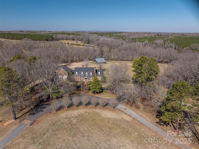 birds eye view of property featuring a rural view