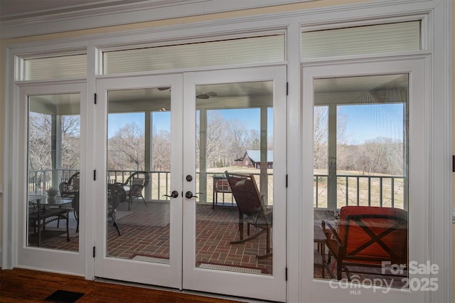 doorway to outside with french doors and visible vents