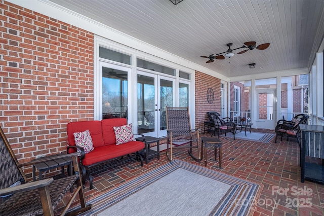 view of patio / terrace featuring an outdoor hangout area, a ceiling fan, and french doors