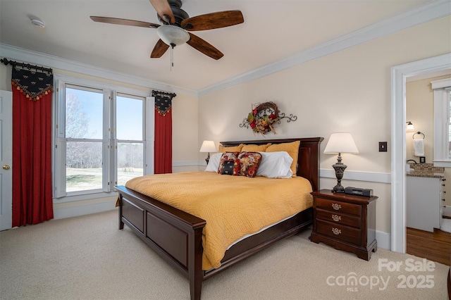 bedroom with light carpet, access to exterior, ceiling fan, and crown molding