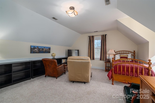 bedroom featuring carpet floors, visible vents, and vaulted ceiling