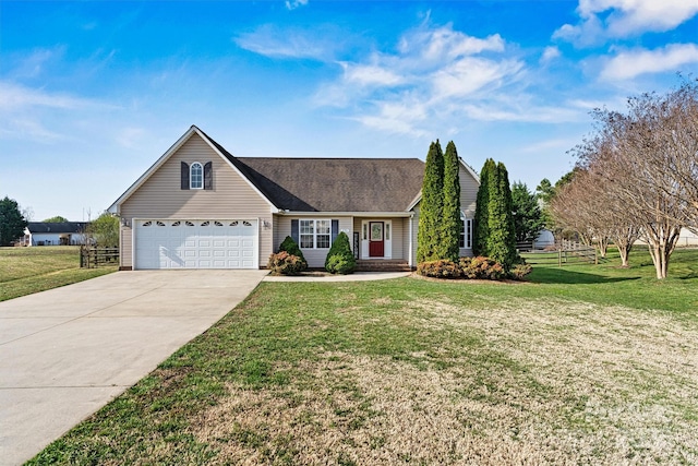 view of front of home with concrete driveway, a garage, and a front lawn