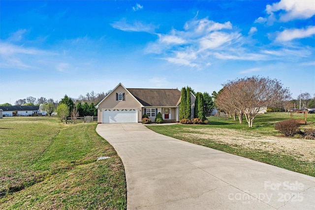 view of front of house featuring driveway, an attached garage, and a front lawn