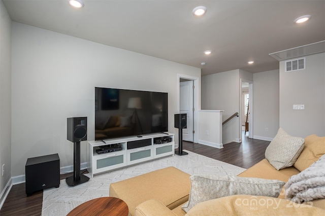 living room featuring recessed lighting, wood finished floors, visible vents, baseboards, and attic access