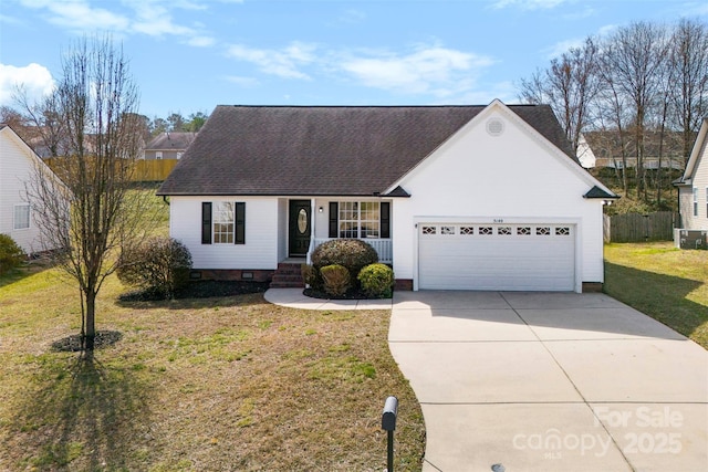 view of front of home featuring an attached garage, fence, driveway, crawl space, and a front yard