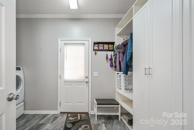 mudroom with baseboards, wood finished floors, washer / dryer, and crown molding