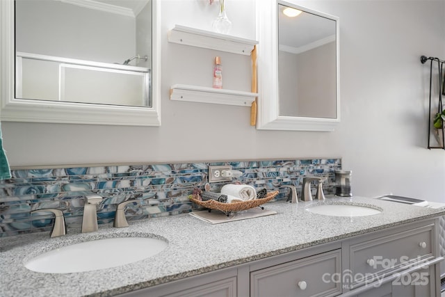 bathroom with ornamental molding, a sink, and tasteful backsplash