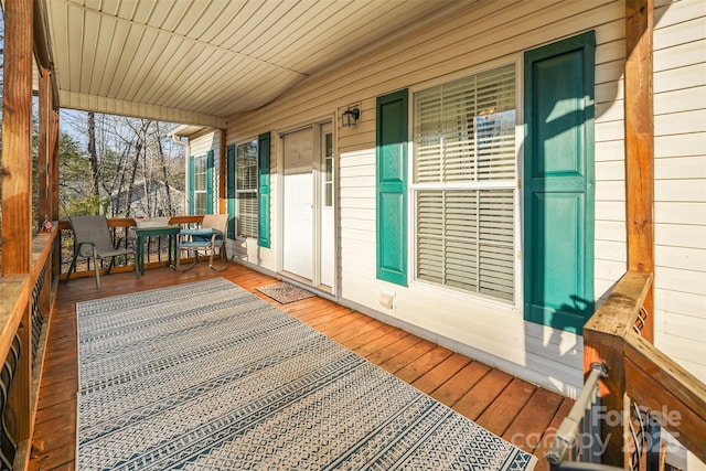 unfurnished sunroom featuring wooden ceiling