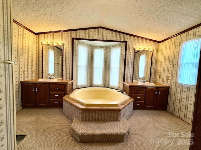 bathroom featuring wallpapered walls, crown molding, vaulted ceiling, and a textured ceiling