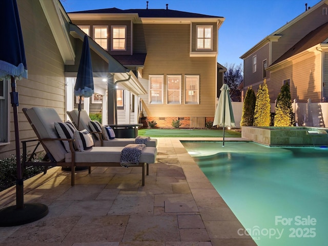 back of house with a patio, crawl space, fence, and a fenced in pool