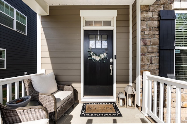 entrance to property with stone siding