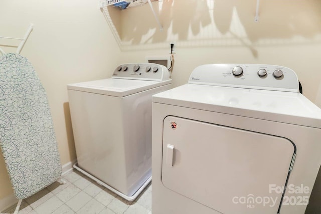 clothes washing area with laundry area and washing machine and dryer