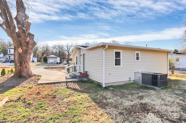 view of property exterior featuring central AC unit