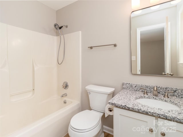 full bath with shower / bath combination, vanity, and toilet