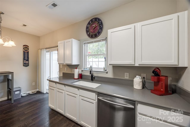 kitchen featuring dark wood-style floors, visible vents, white cabinets, a sink, and dishwasher