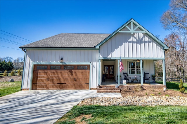 modern farmhouse style home with a porch, concrete driveway, an attached garage, and a shingled roof