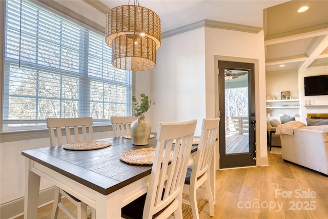 dining area featuring recessed lighting, ceiling fan with notable chandelier, light wood-style floors, and ornamental molding