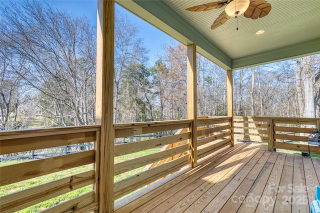 wooden terrace with ceiling fan