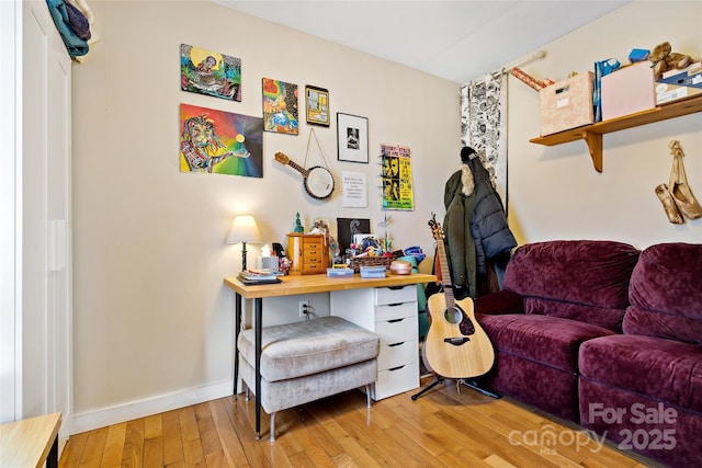 office with light wood finished floors and baseboards