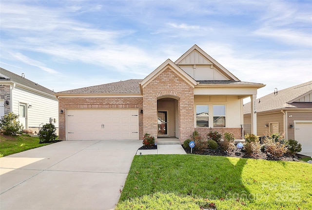 view of front of home with brick siding, board and batten siding, a front yard, a garage, and driveway