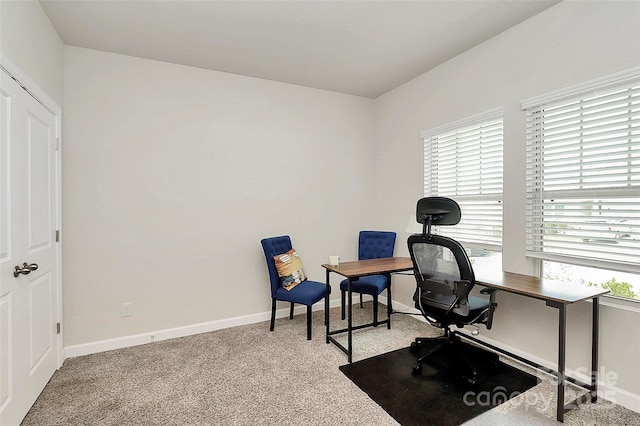 office area with carpet flooring and baseboards