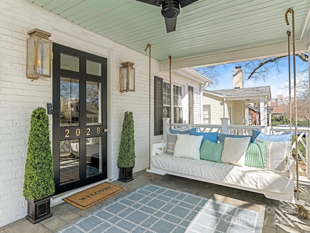 view of patio featuring ceiling fan