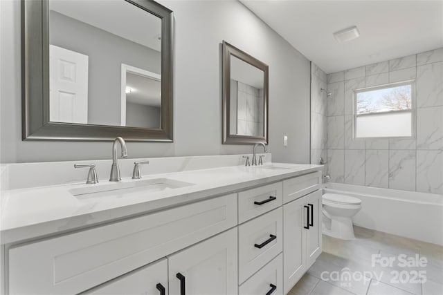 full bathroom featuring shower / tub combination, a sink, toilet, and double vanity