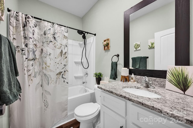 full bathroom with shower / bath combination with curtain, vanity, and toilet