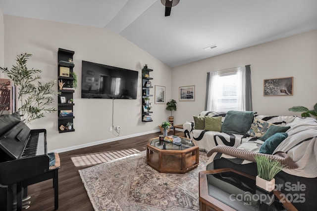 living room with lofted ceiling, ceiling fan, dark wood-type flooring, visible vents, and baseboards