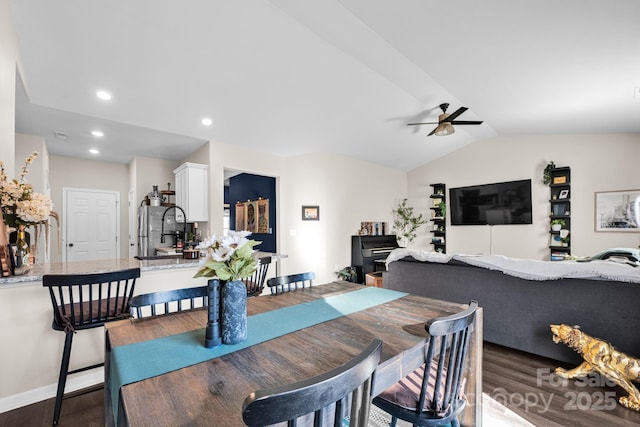 dining room with ceiling fan, lofted ceiling, dark wood finished floors, and recessed lighting