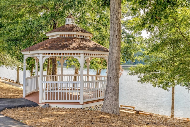 view of property's community featuring a gazebo and a water view