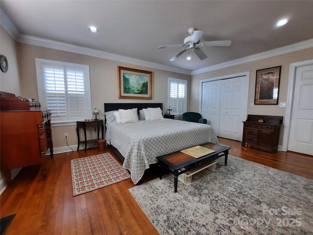 bedroom featuring crown molding, baseboards, wood finished floors, and recessed lighting