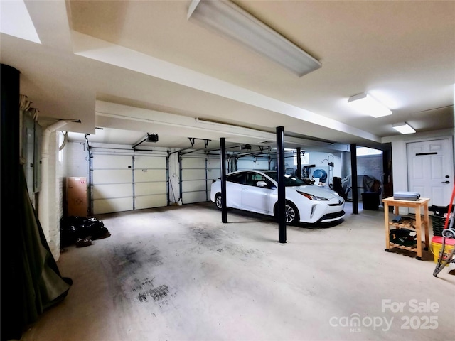 garage featuring a garage door opener