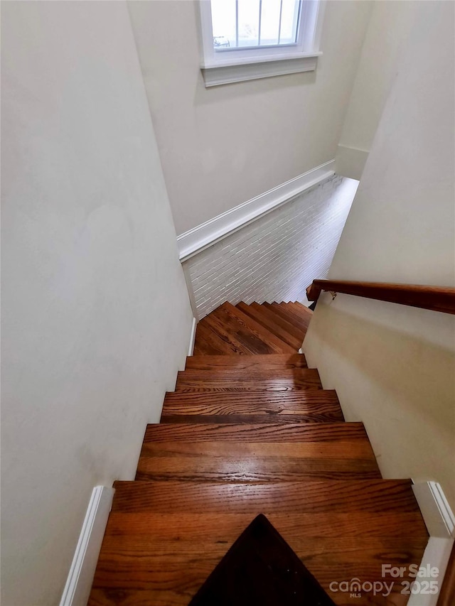 stairway with baseboards