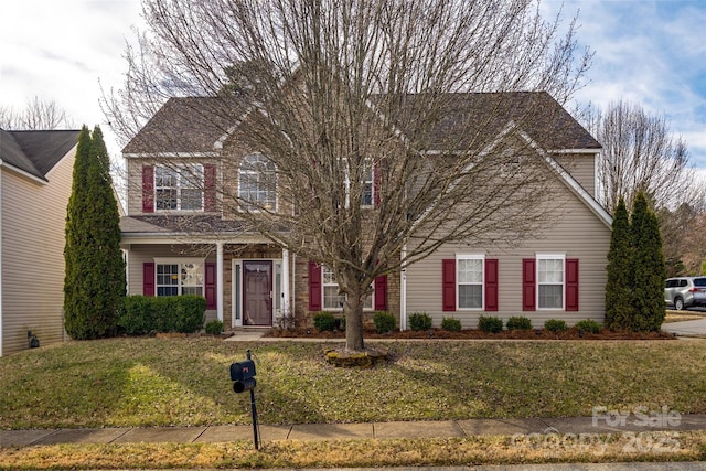 view of front of house featuring a front yard