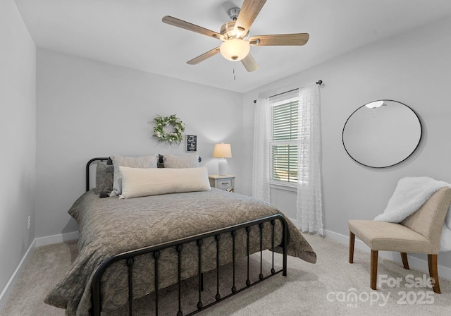 bedroom with light carpet, ceiling fan, and baseboards