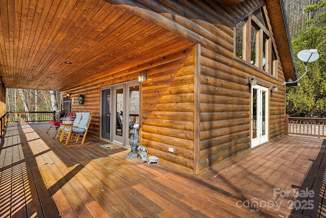 wooden terrace featuring french doors