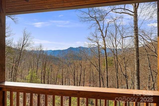 view of mountain feature featuring a wooded view