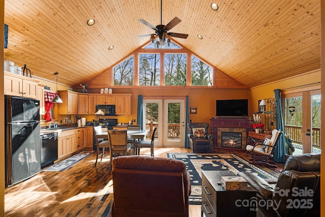 living room with french doors and wooden ceiling