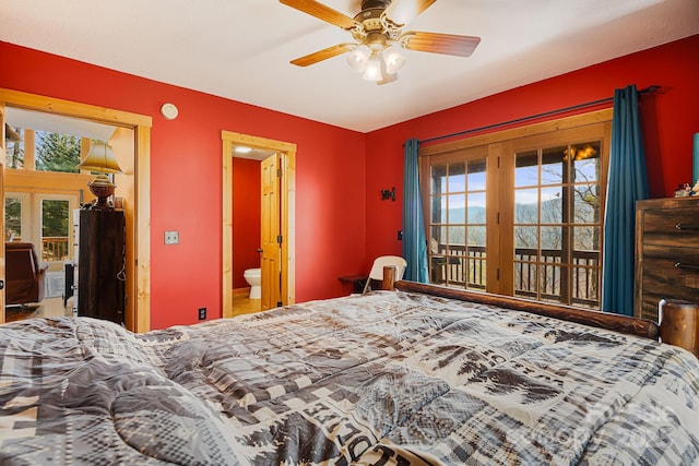 bedroom with a ceiling fan, access to outside, french doors, and ensuite bathroom