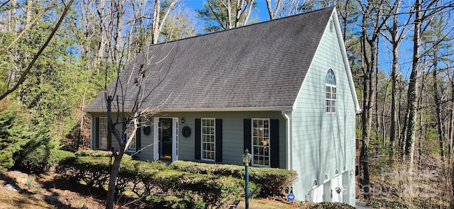 view of front facade featuring a shingled roof