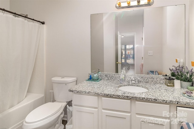 full bathroom featuring shower / tub combo, vanity, and toilet