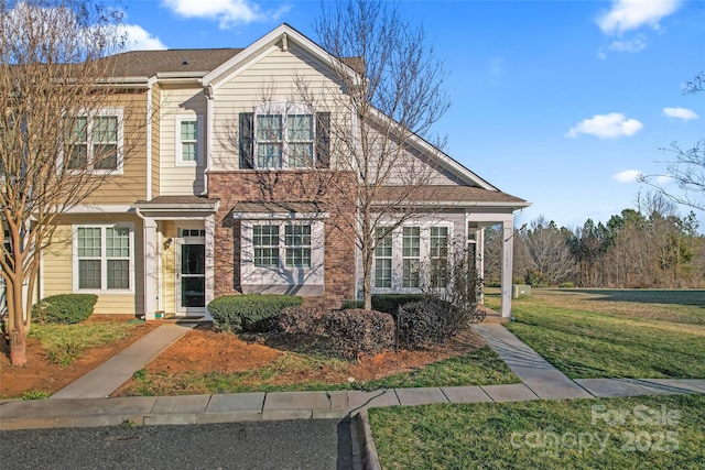 view of front of home with a front yard