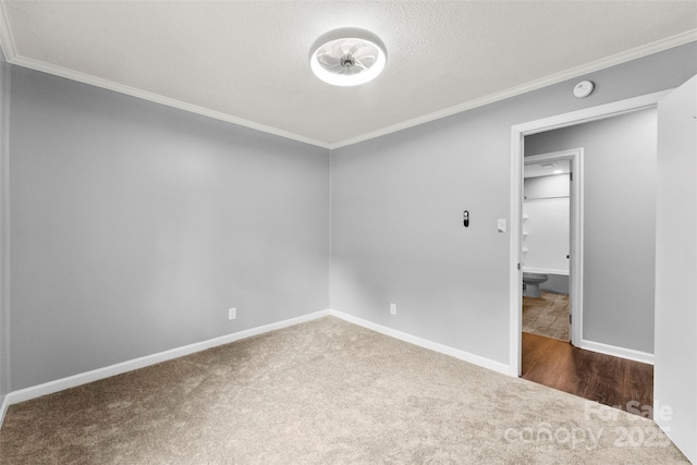 228 Tot Dellinger Rd, Cherryville, NC 28021 - spare room with carpet floors, crown molding, baseboards, a smoke detector, and a textured ceiling
