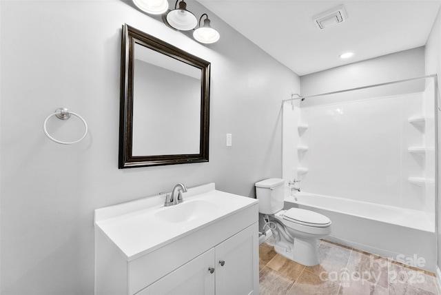 228 Tot Dellinger Rd, Cherryville, NC 28021 - bathroom with vanity, toilet, and bathtub / shower combination